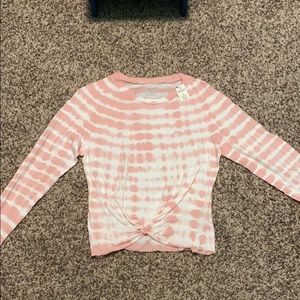 pink and white tie dye long sleeve shirt